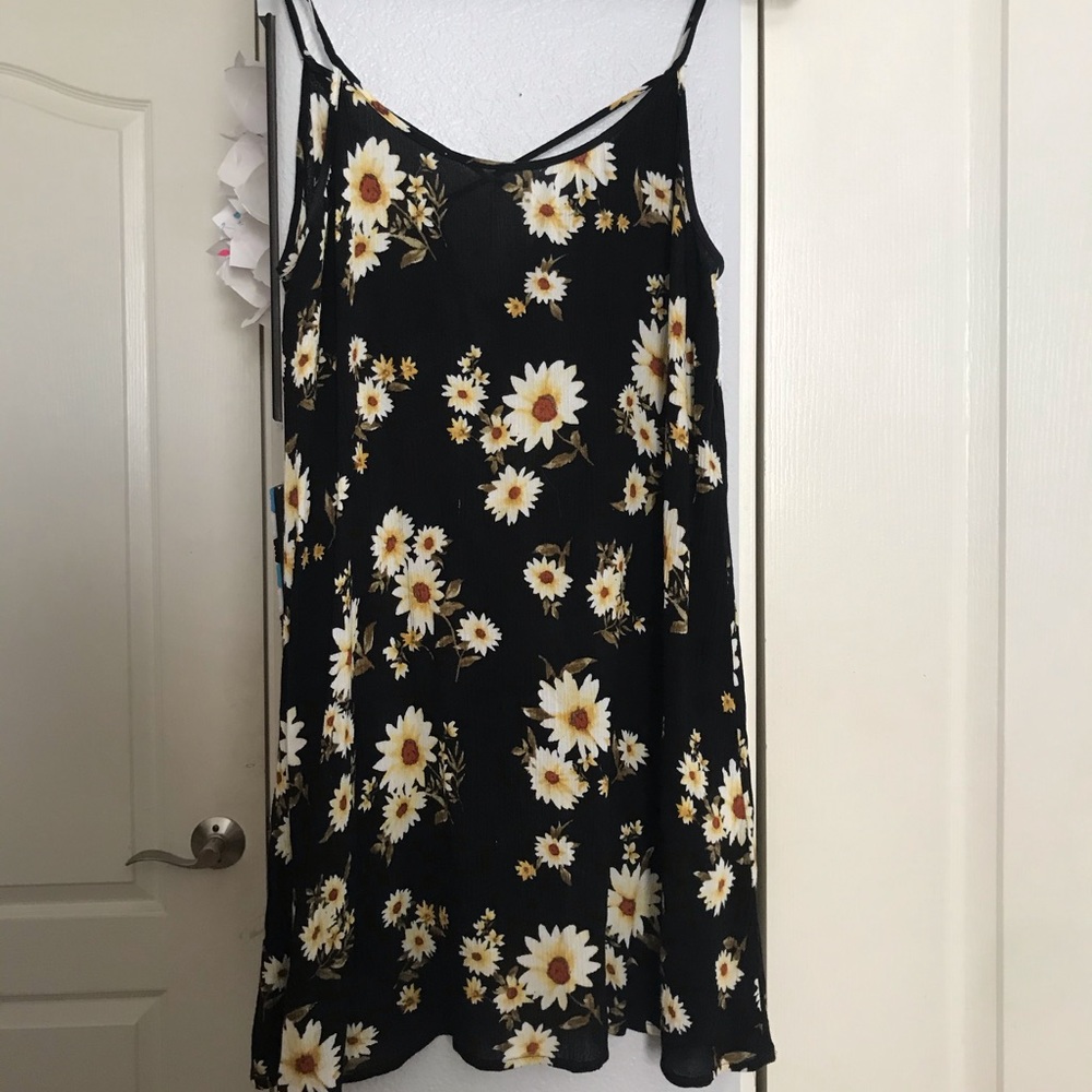 Black sundress with yellow floral pattern